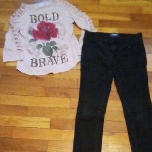 Girl 10 black skinny jeans, and shirt with cutout sleeves
